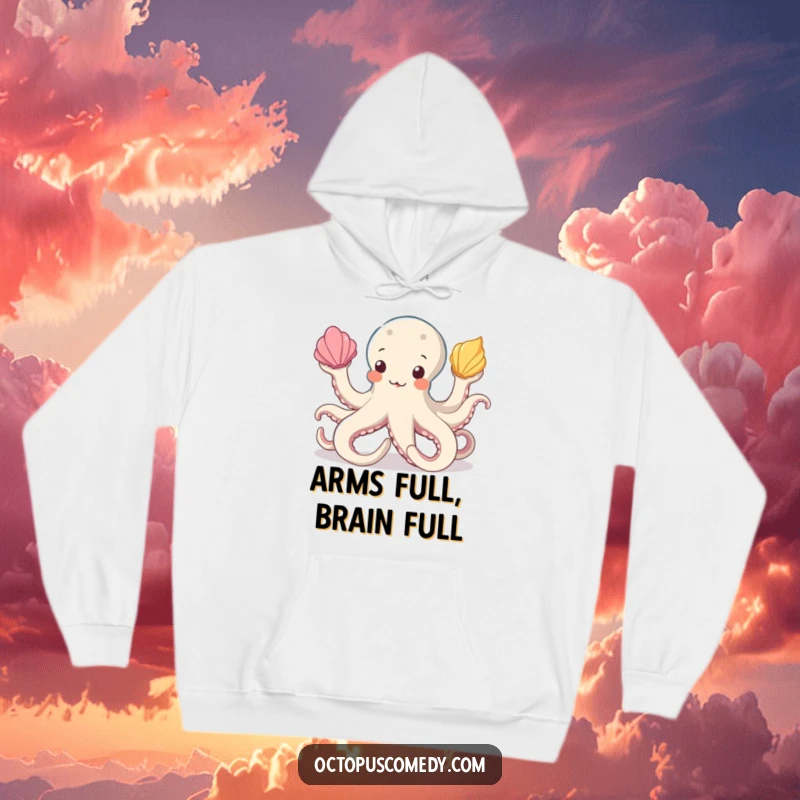 Funny octopus hoodie featuring a contented octopus artistically juggling three bright seashells, ideal for a cozy and humorous look.