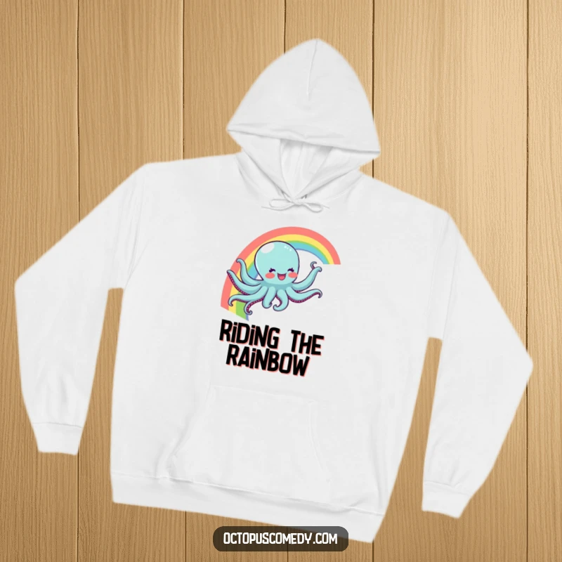 Funny hoodie featuring a joyful octopus sliding down a vibrant rainbow, offering cozy comfort and a touch of magical humor as a funny gift.